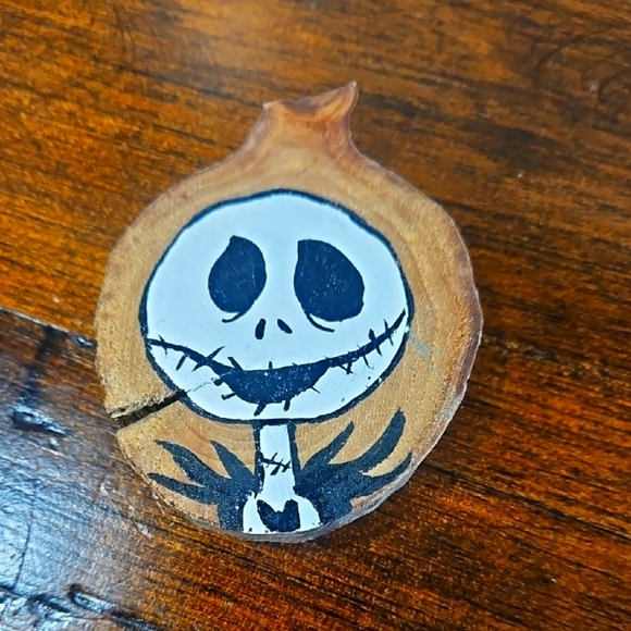 Hand-Painted Wooden Ornament with Skeleton Design - Picture 1 of 3